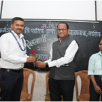 Felicitation of Vice Chairman of Students’ Council ( Dr.V.N. Game ) by the President of Students’ Council ( Dr.BapusahebD.Bhakare )